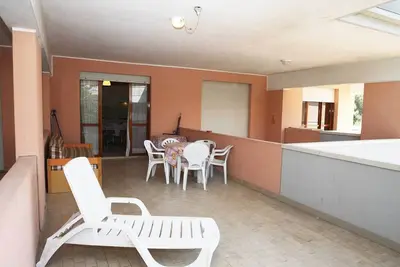 Image de Res. Solarium spacious apartment with one sleeping room with a big terrace and swimming pool