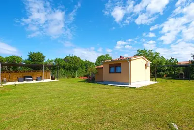 Image de Maison de vacances avec terrasse et climatisation