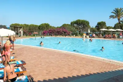 Image de Agréable appartement pour 4 personnes avec Wifi, climatisation, piscine, terrasse et animaux admis