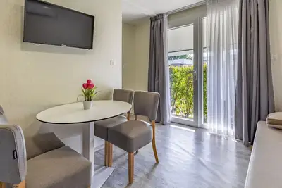 Image de Bel appartement dans une maison de vacances avec piscine, climatisation, Wifi, Tv, terrasse