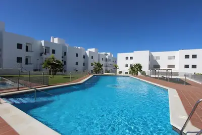 Image de Charmante et moderne apparement avec balcon et vue mer, piscine près de la plage.