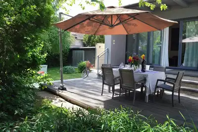 Image de Apartment mit Terrasse und Garten
