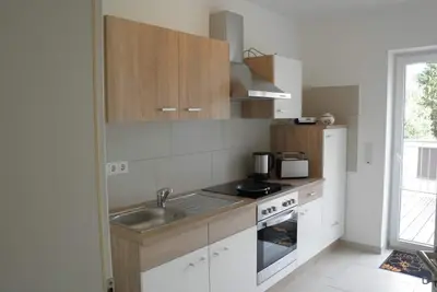 Image de Appartement Im Jungenwald - Gästehaus Greimerather Forst