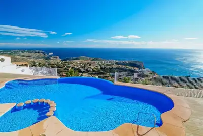 Image de Joli appartement pour 4 personnes avec piscine, Wifi, climatisation, Tv, terrasse et vue panoramique