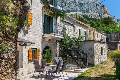 Maison de vacances Podgora pour 1 - 4 personnes avec 2 chambres à coucher - Maison jumelée
