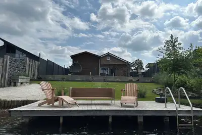 Image de Ferienhaus am See mit Sauna