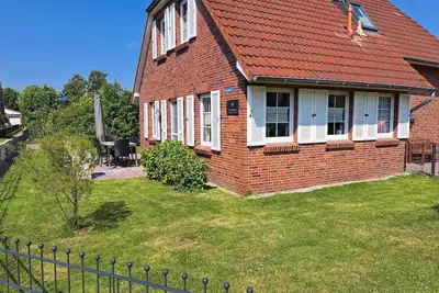 Image de Maison de vacances Neßmersiel pour 1 - 6 personnes avec 3 chambres à coucher - Maison de vacances