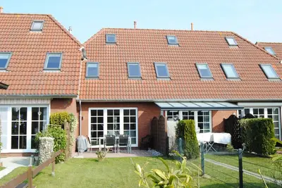 Image de Maison de vacances Neßmersiel pour 1 - 5 personnes avec 3 chambres à coucher - Maison de vacances