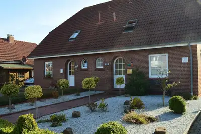 Image de Maison de vacances Neßmersiel pour 2 - 6 personnes avec 3 chambres à coucher - Maison jumelée
