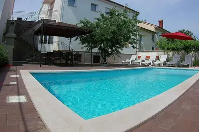 Image de Appartement de vacances Pula pour 2 - 7 personnes avec 3 chambres à coucher - Appartement de vacance