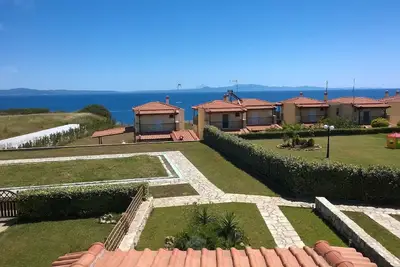 Image de Maison de vacances Nea Moudhania pour 1 - 5 personnes avec 3 chambres à coucher - Maison jumelée