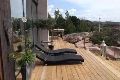 Image de maison de vacances \"Stora Utsikten\" avec vue sur l'eau