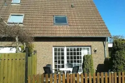 Image de Maison de vacances Dornumersiel pour 1 - 4 personnes avec 2 chambres à coucher - Maison jumelée