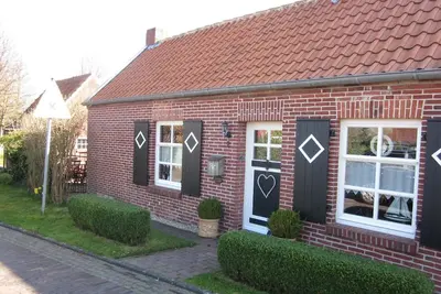 Image de Maison de vacances Krummhörn pour 1 - 4 personnes avec 1 chambre à coucher - Maison de vacances