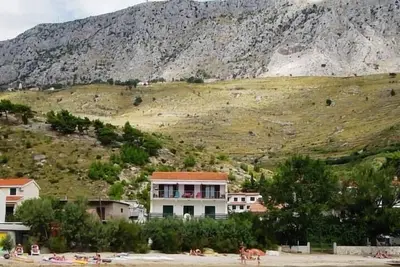 Image de Appartement de vacances pour 4 personnes  + 2 enfants env. 100 qmà Duce, Dalmatie (Centre de la Dalmatie)