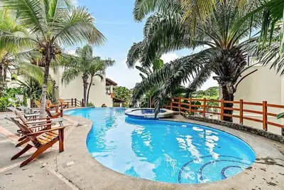 Colorful classy modern split level unit near beach in Coco with pool