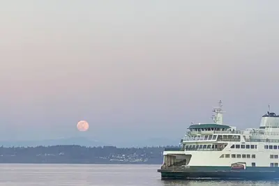 Beach house with views of Puget Sound, ferry, North Cascades, Mt Baker, Rainier.