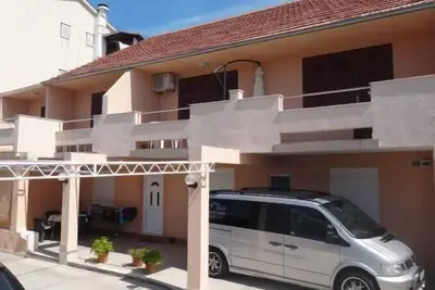 Image de Appartement de vacances Tisno pour 1 - 4 personnes avec 2 chambres à coucher - Maison mitoyenne