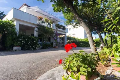 Image de Appartement de vacances avec air conditionné et vue sur la mer
