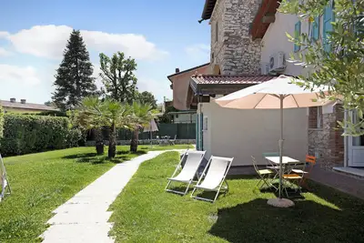 Image de Appartement de vacances \"Ligustro\" avec terrasse privée, jardin partagé et piscine