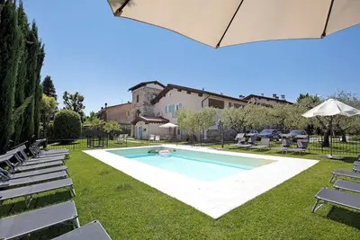 Image de Charmant appartement de vacances \"Olivo\" Wi-Fi, jardin et piscine partagés