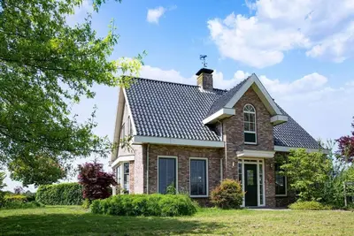 Image de Ferme א Genderen avec terrasse