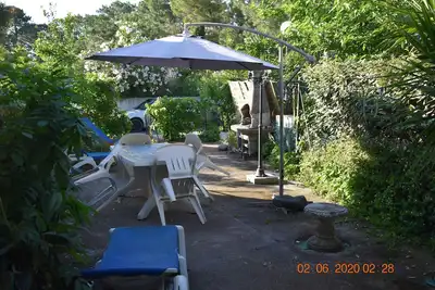 Image de Plage<100m. Clim. Wifi. Jardin clôturé. bbc. Parking. opt voiture. Nbrs activités