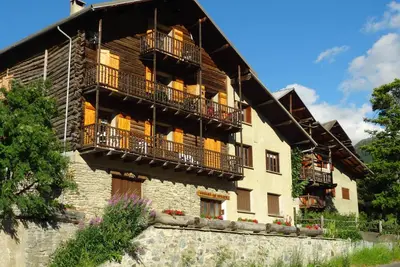 Appartement \"le Grenier\" dans un ancien chalet queyrassin