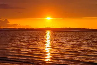 Image de Oceanfront Condo with beautiful Sunsets - Dolphins, Pools, and family fun