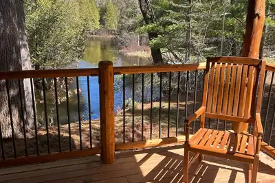 Image de Lodge on the Manistee :Firelight & Snowfall—A Magical Winter Escape on the Manistee