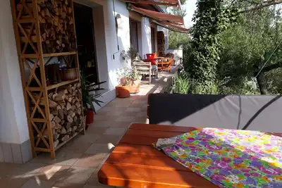 Image de Bungalow on the outskirts with terrace under mature trees