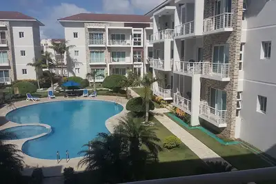 Image de Family-friendly 3bd central Sosua condo wih large pool, Wifi, Bbq, A\/C, Cable Tv