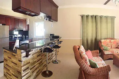 Image de Beachfront 2bd condo in central Sosua, pool/cable Tv/Ac/internet