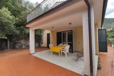 Apartment with large patio and garden a few steps from the center of Maratea