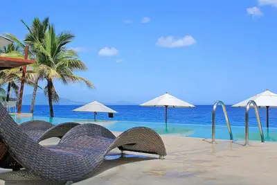 Image de Cozy condo on the beach, near shops and markets, super discounts in low season