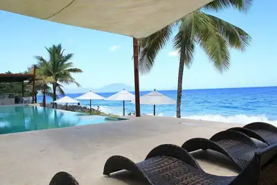 Image de Secure beachfront resort in central Sosua, top floor, infinity pool, WiFi\/Ac\/Tv