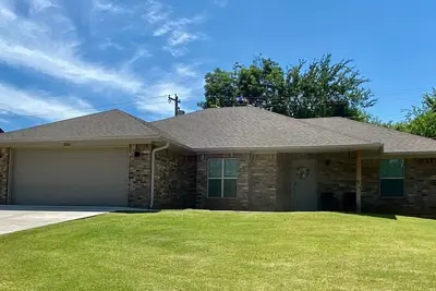 Image de **Magnolia Cottage** Sleeps 6. Minutes to Casino, Concerts, Lake, College