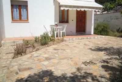 Image de S'Apposentu-Casa l'Olivastro. 100 sqm garden with outdoor shower and barbecue.