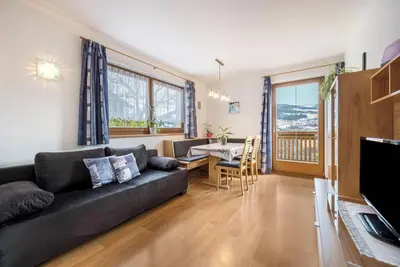 Image de Appartement de vacances avec vue sur les montagnes, terrasse panoramique et balcon