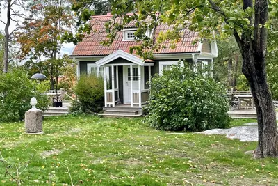 Image de Charming lake house with private shore and amazing seaview