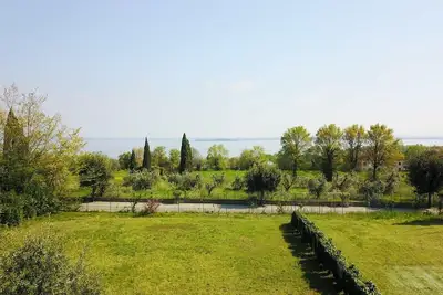 Image de Maison de vacances Manerba del Garda pour 1 - 9 personnes avec 4 chambres à coucher - Maison jumelée