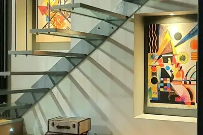 Image de Ponte Milvio Luxury House offers 5 Star spaces, furnishings, services and comfort.