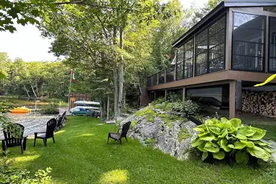 Image de Bay Beach Cottage - Halls Lake. Shallow privé Sandy Beach