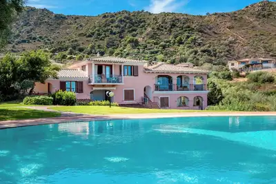 Image de Appartement \"Cala Brandinchi\" avec vue sur la mer, terrasse privée et piscine partagée