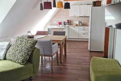 Image de Vacation at the center. Newly renovated vacation apartment in the former bakery