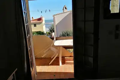 Image de Plage<50m. Balcon équipé. Parking. Option voiture, vélo. Wifi. Nombreuses activités