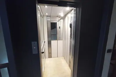 Image de Questa elegante villa offre camere perfetto per viaggi di lavoro o di coppia