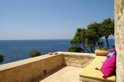 Image de Pretty  seafront cottage in the center of Stoupa, minutes from the sandy beaches