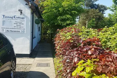 Image de Tunnag cottage is around 10 mins walk to a Beautiful Tralee beach