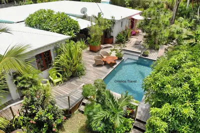 Image de Gîtes Atemoya. Piscine, plage à 400 m. , Cannelle (4p) clim, piscine, beau jardin, plage 400 m